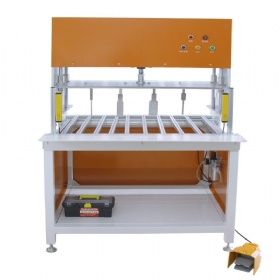Automated Waste Stripping Machine for Inner Box Holes.
